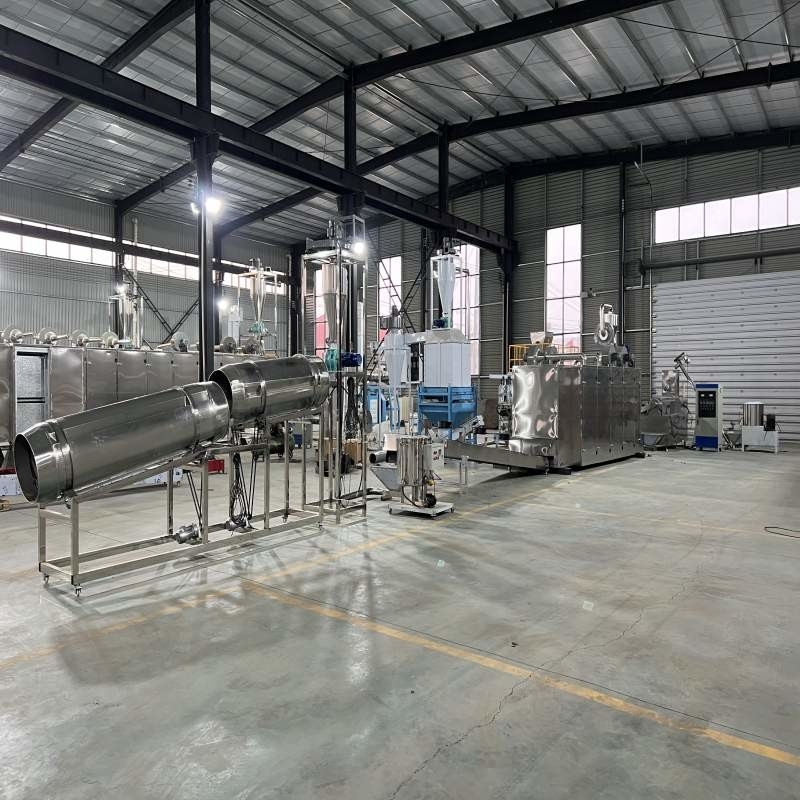 Ligne de production d'aliments pour cois et ligne de production d'extrudeuses flottantes pour aliments ornementaux